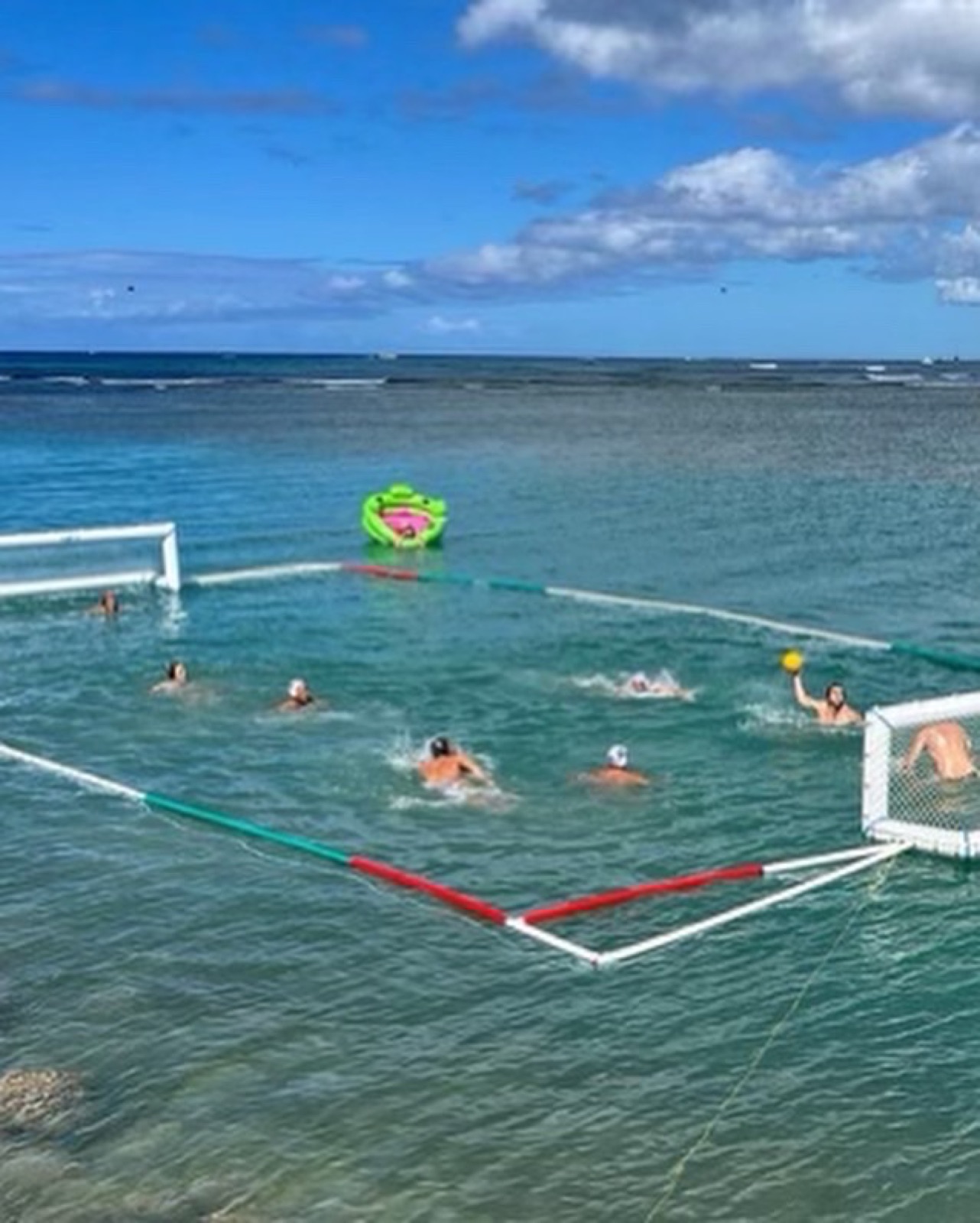 A floating water polo court set up in the open ocean