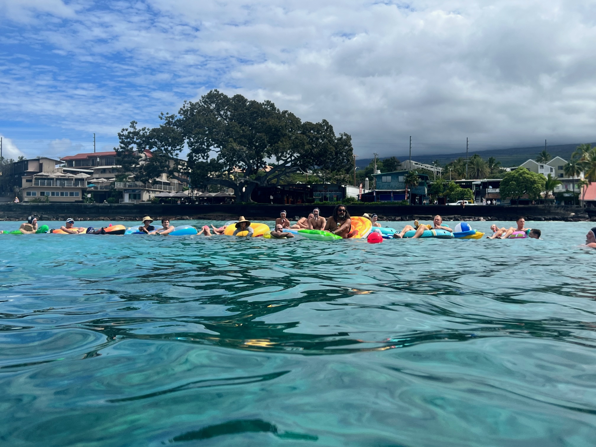Athletes in open ocean water during a water polo session